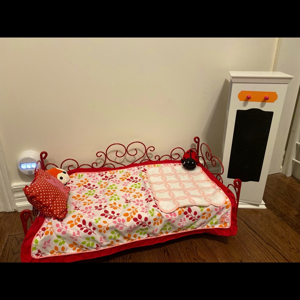 Doll bed with spinning tower